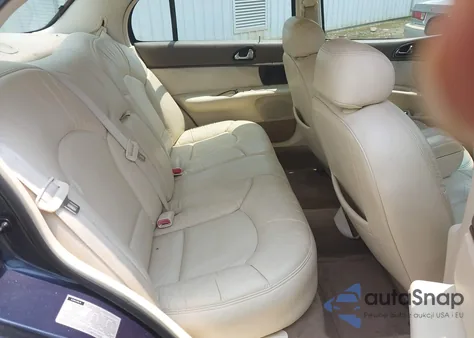 1997 Lincoln Continental z USA, uszkodzony, nr VIN 1LNLM97V7VY624356